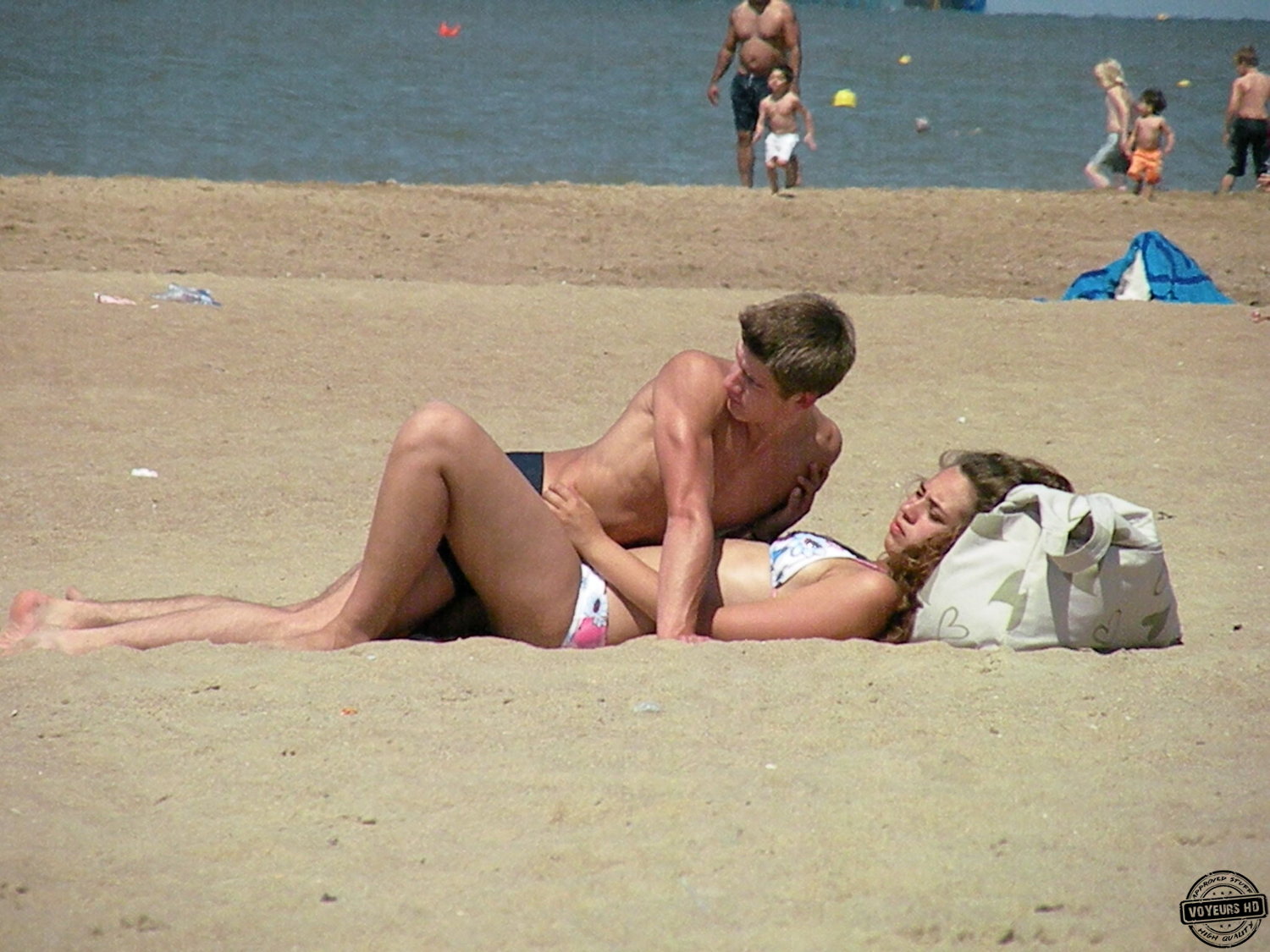 Teen couple caught fucking beach