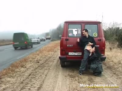 Teen gets fucked by older man on the side of the road and cums.