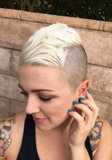 Blue B. reccomend girl with shaved head tattoos